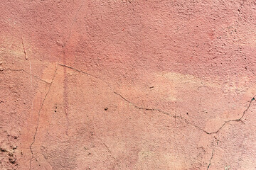 Pink cement wall texture for background and design art work