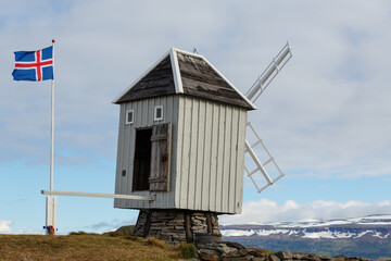 Windmill in Iceland with Icelandic Flag