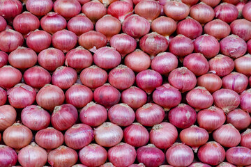 Stack of Onions in market, in Mysore, India
