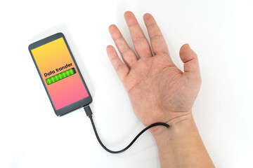 Robotic arm transfering data form a cellphone concept