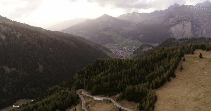 Revealing Aerial of Selva Val Gardena in South Tyrol at Sunset. Ethereal 4K