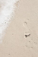 Fototapeta na wymiar footprints in sand