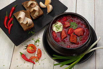  Russian borscht with sour cream garlic, pepper and sauce, Ukrainian borscht with sour cream, food background, Food and health
