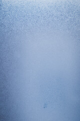 blue steam condensation on a glass - freshness abstract background