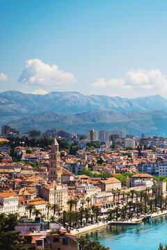 Fototapeta Split, Croatia, city scape in sunny day with Asian tourist posing on stone balcony