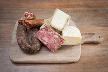 cold cuts  and cheeses typical food of the Rome area isolate don wooden background