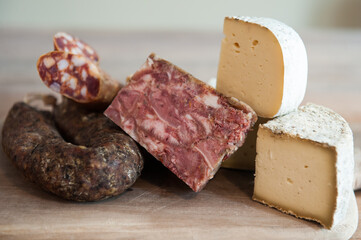 cold cuts  and cheeses typical of the Rome area on wooden surface