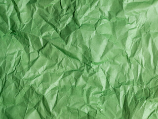 Crumpled green paper. Paper texture. copy spase, top view.