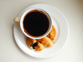 cup of coffee and croissant