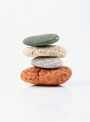 Fototapeta na wymiar Zen stones on white background.