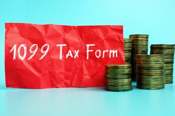 Financial concept about 1099 Tax Form with phrase on the sheet.