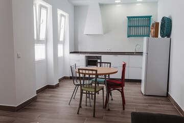 Kitchen inside a modern style rental house.