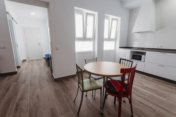 Kitchen inside a modern style rental house.