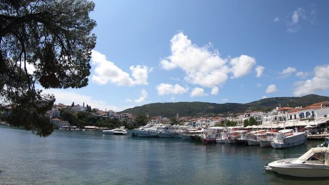 Many tourist boats in the old port waiting for the tourist to take them to one of many day trips around the island or tours that include visiting neighbor island Skopelos, also part of Sporades group 