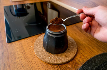 Making coffee in a geyser coffee maker at home