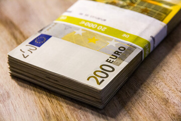 A pile of 200 (twohundred) Euro banknotes.