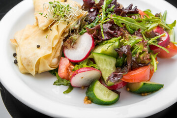Savoury Buckwheat Pancakes with Cherry Tomatoes, Rocket Salad, Spinach, Parma Ham,