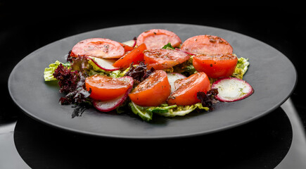 tomato salad with basil, black pepper and garlic