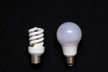 Energy-saving halogen and LED lamps. Electricity conservation concept, light source selection. The...