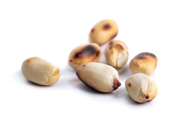 Roasted at home peanuts isolated on white background