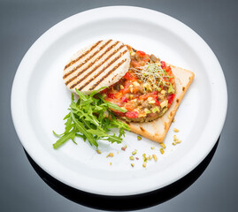 Bruschetta with tomato, mozarella and basil