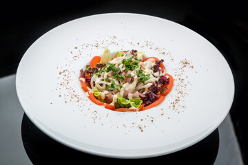 Chicken salad, Salad with meat and tomato on a plate