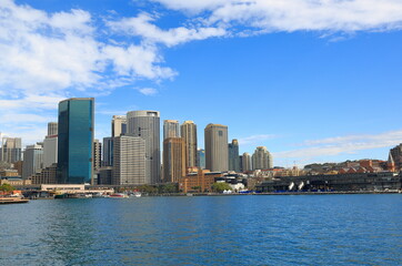 Fototapeta na wymiar Sydney, business centers / Australia - May 2014: View of business center buildings from the sea.