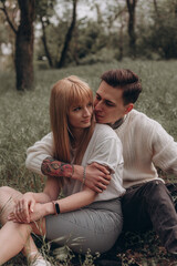 happy young couple in the park