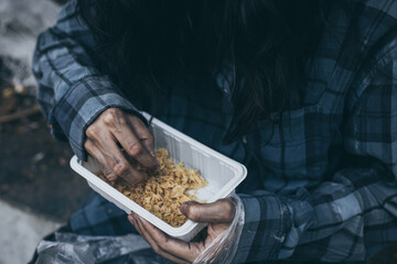 poor people,homeless or beggar begging for help sitting at dirty slum.concept for poverty hunger,human rights,donate and charity for underprivileged children in third world