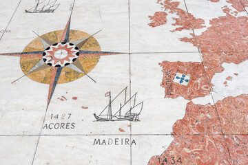 detail of the mappa mundi, created from beige, black and red limestone in Lisbon, Portugal