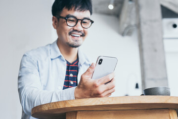 man using cell phone.hand holding texting message on screen mobile chatting,search internet...
