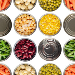 Seamless food background made of opened canned chickpeas, green sprouts, carrots, corn, peas, beans and mushrooms on white background