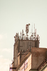 The roof of a large skyscraper on which there are antennas for radio communications and telecommunication plates