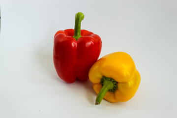 Fresh summer vegetables for salad. Sweet red and yellow pepper. Food for vegetarians