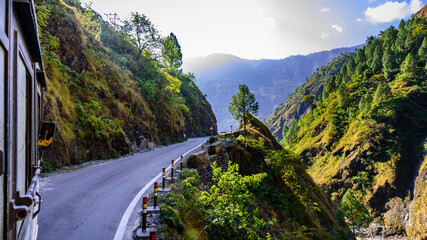 View from hilly mountain road travelling through Himalayas mountains near Munsiyari, Uttarakhand,...