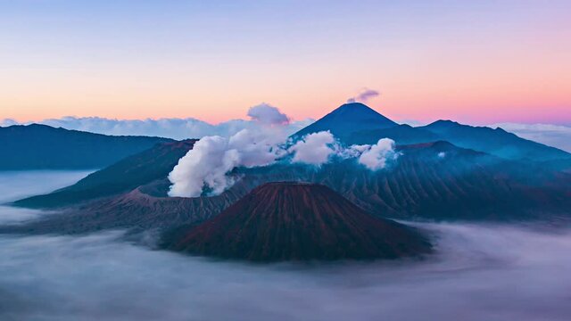 Sunrise Over The Volcano Mountains Time lapse, Landmark Nature Travel Place Of East Java, Indonesia (tilt down)