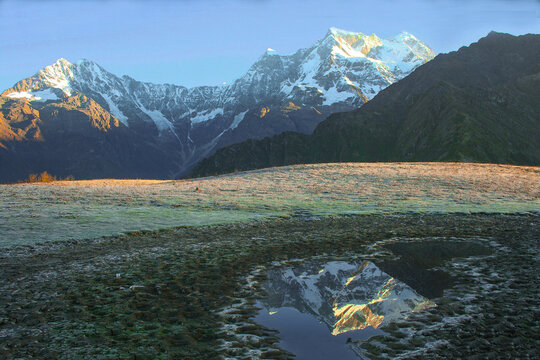 The Reflection of Mountain Choukhamba on the Lake