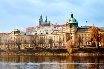 Fototapeta na wymiar View to the Prague Government Office and Prague Castle from the Vltava river. Famous place in the Czech Republic, ancient Hradcany hill with the president office and Straka academie