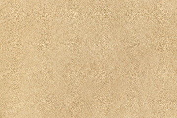 Fototapeta na wymiar Background and texture of clean sand of a beach