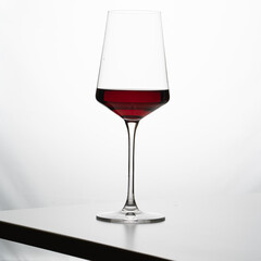 
glass of wine on a white background