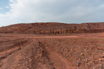 Sandy gravel ground surface and earth slope on construction land