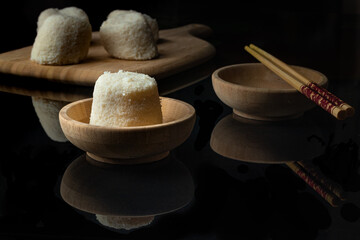 Idli in a wooden bowl