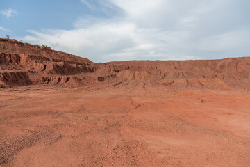 Sandy gravel ground surface and earth slope on construction land