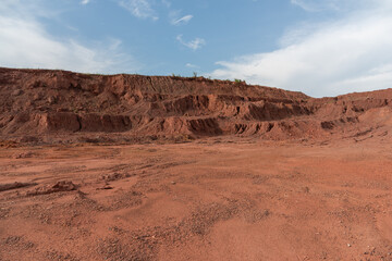 Sandy gravel ground surface and earth slope on construction land
