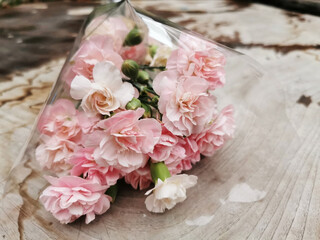 bouquet of pink flowers on table