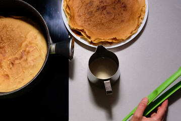 Closeup of cooking pancakes on a stove