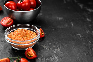 Portion of Tomato Powder (close up; selective focus)