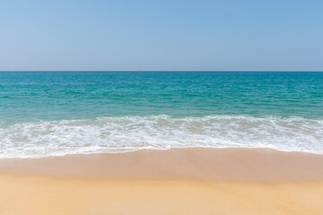 Fototapeta na wymiar Beautiful tropical landscape beach sea and sand in Mai Khao Beach,Phuket, Thailand .