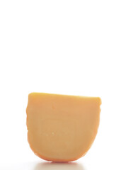 Hard Dutch gouda cheese on white