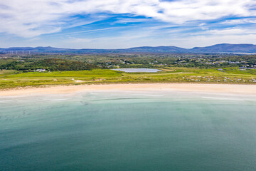 Aerial view of the awarded Narin Beach by Portnoo and Inishkeel Island in County Donegal, Ireland